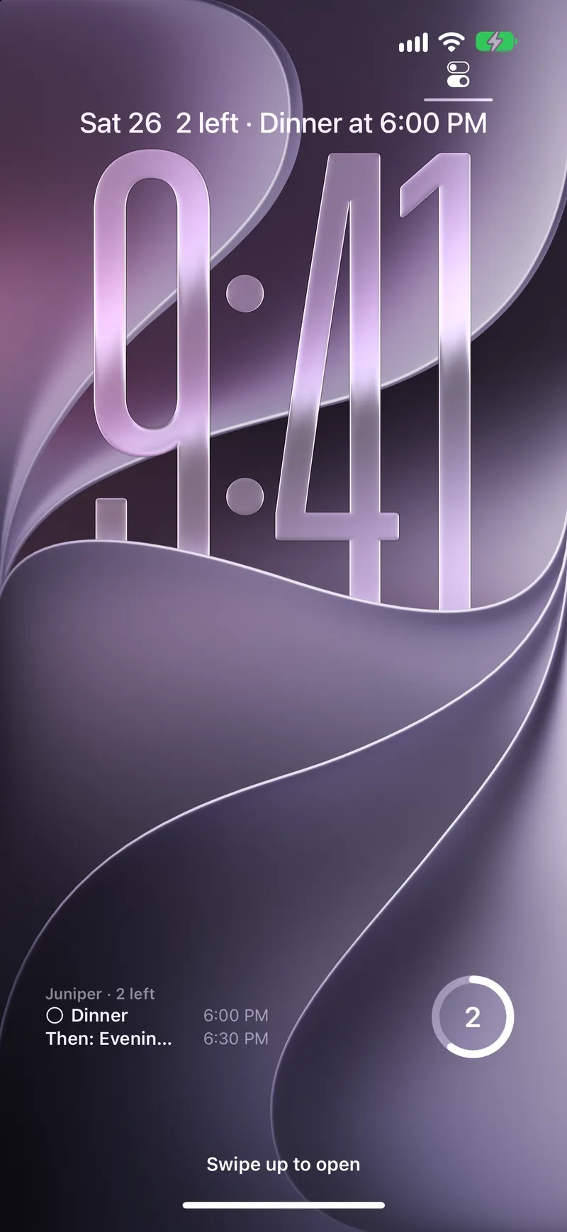 The lock screen with three Toffee widgets: “2 left · Dinner at 6:00 PM” above the clock, Juniper’s next tasks with a tick button, and a ring showing two left.